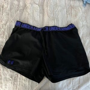 Black under armour athletic shorts with purple accents